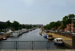 Boats on the canal - houseboats are moored on the left hand side