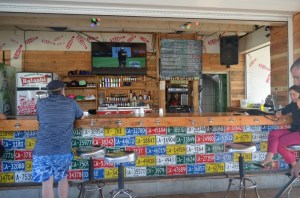 Old number plates decorate a bar