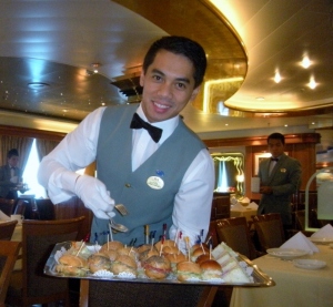 What's not to love about waiters in white gloves serving afternoon tea